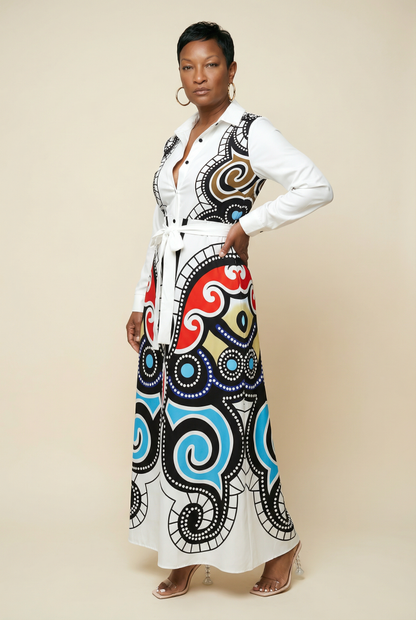 Woman wearing a white shirt with a colorful, patterned skirt on a beige background